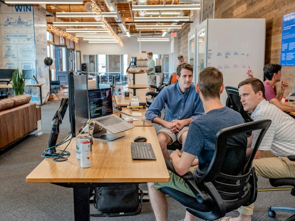 Funding specialists reviewing a business line of credit application